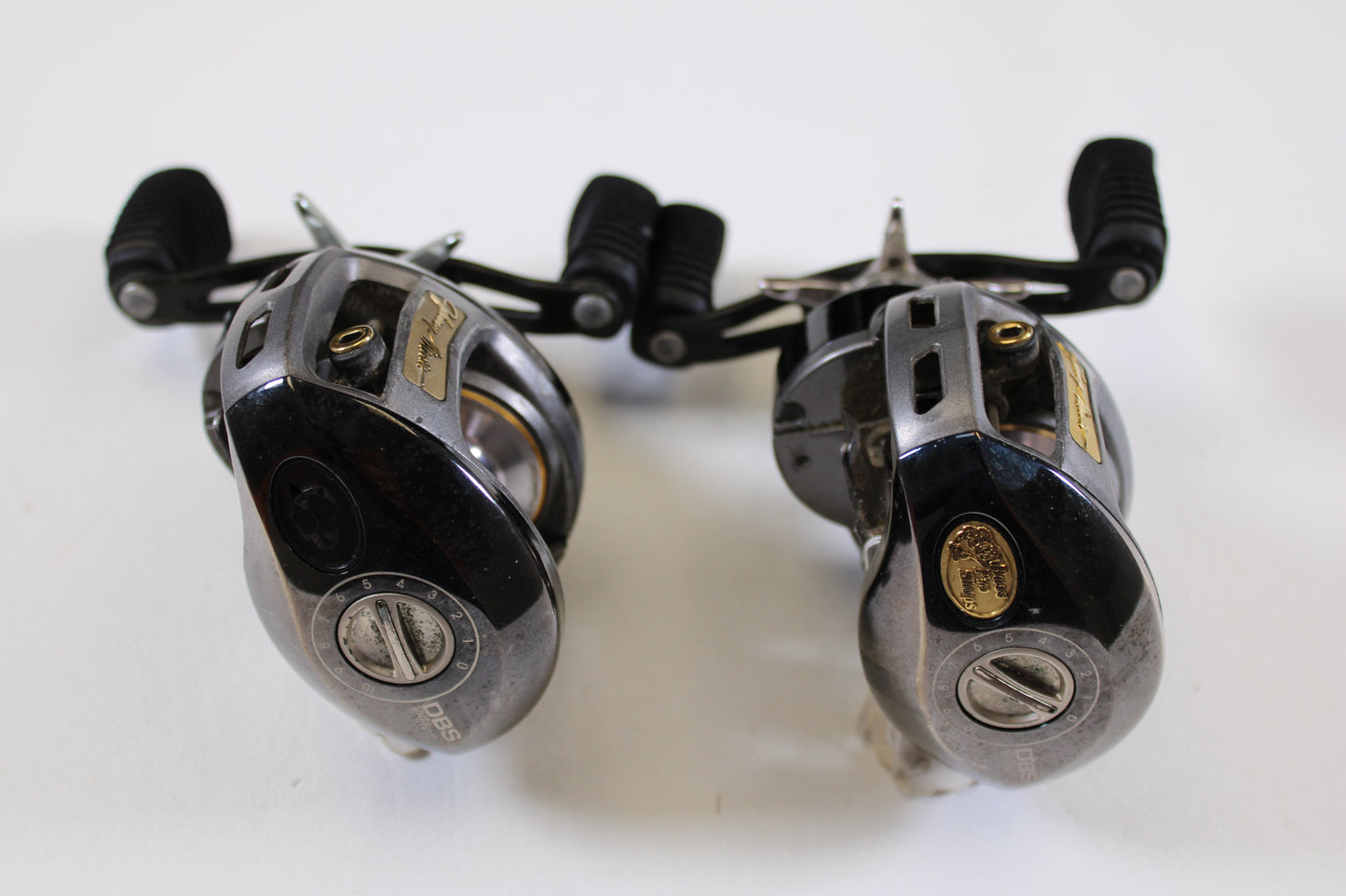 Two Bass Pro Shops Johnny Morris JMX10HD 6.4:1 RH used casting reels in good condition—upgrade through our rod and reel trade-in program or earn store credit on your used gear! Qty: 2.