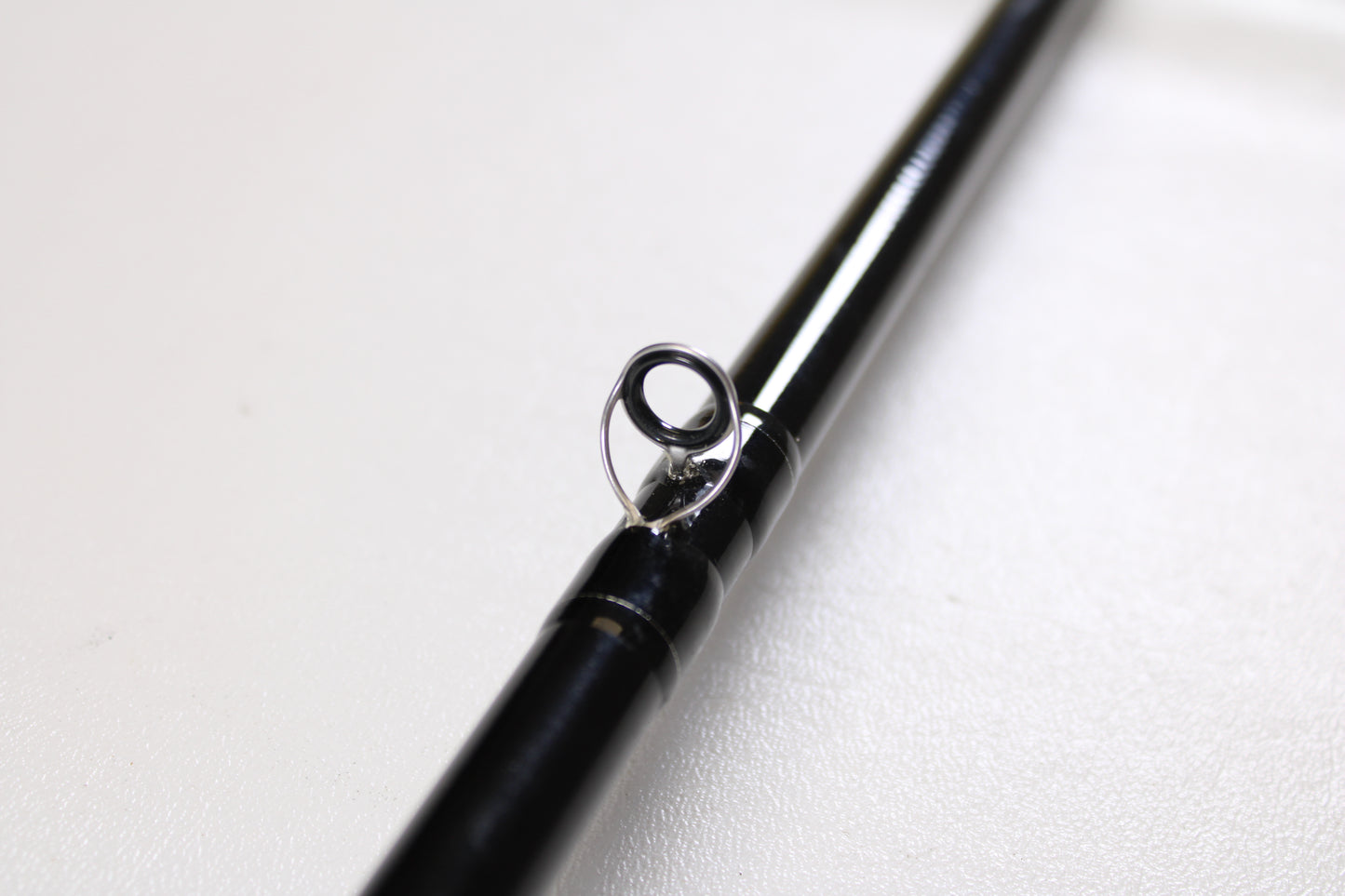 Close-up of an Evergreen International Combat Stick RCTC-70MHG 7'0" Medium Heavy Glass Used Casting Rod in excellent condition—great for those seeking used gear or aiming to boost store credit with our rod and reel trade-in program.