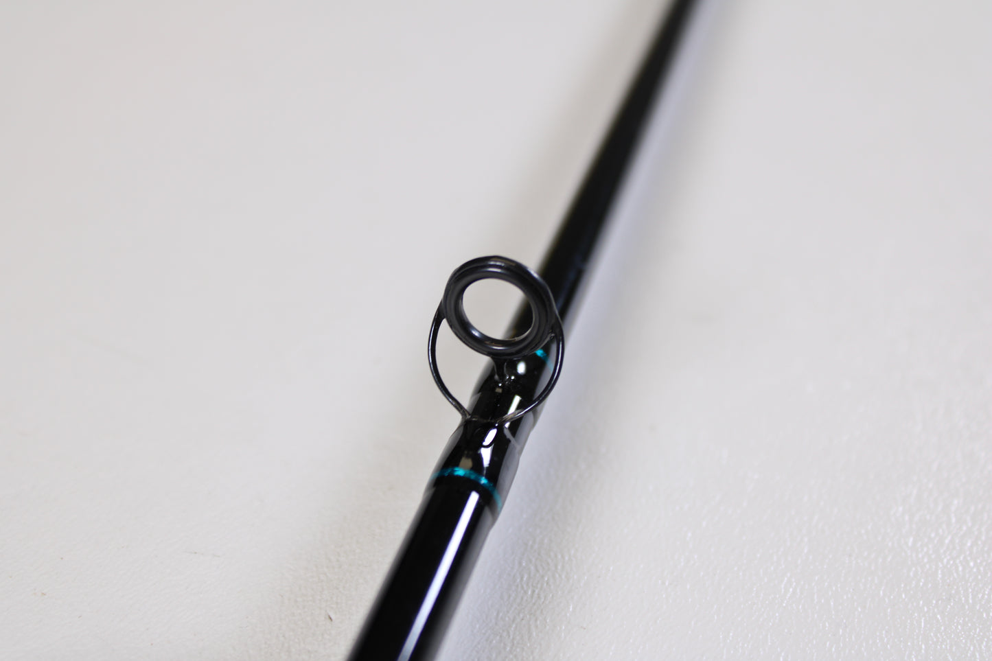A close-up view of the St. Croix Premier PC66MF 6'6" Medium Used Casting Rod in excellent condition, focusing on a line guide—ideal for anglers interested in quality used St. Croix gear or considering a rod trade-in.