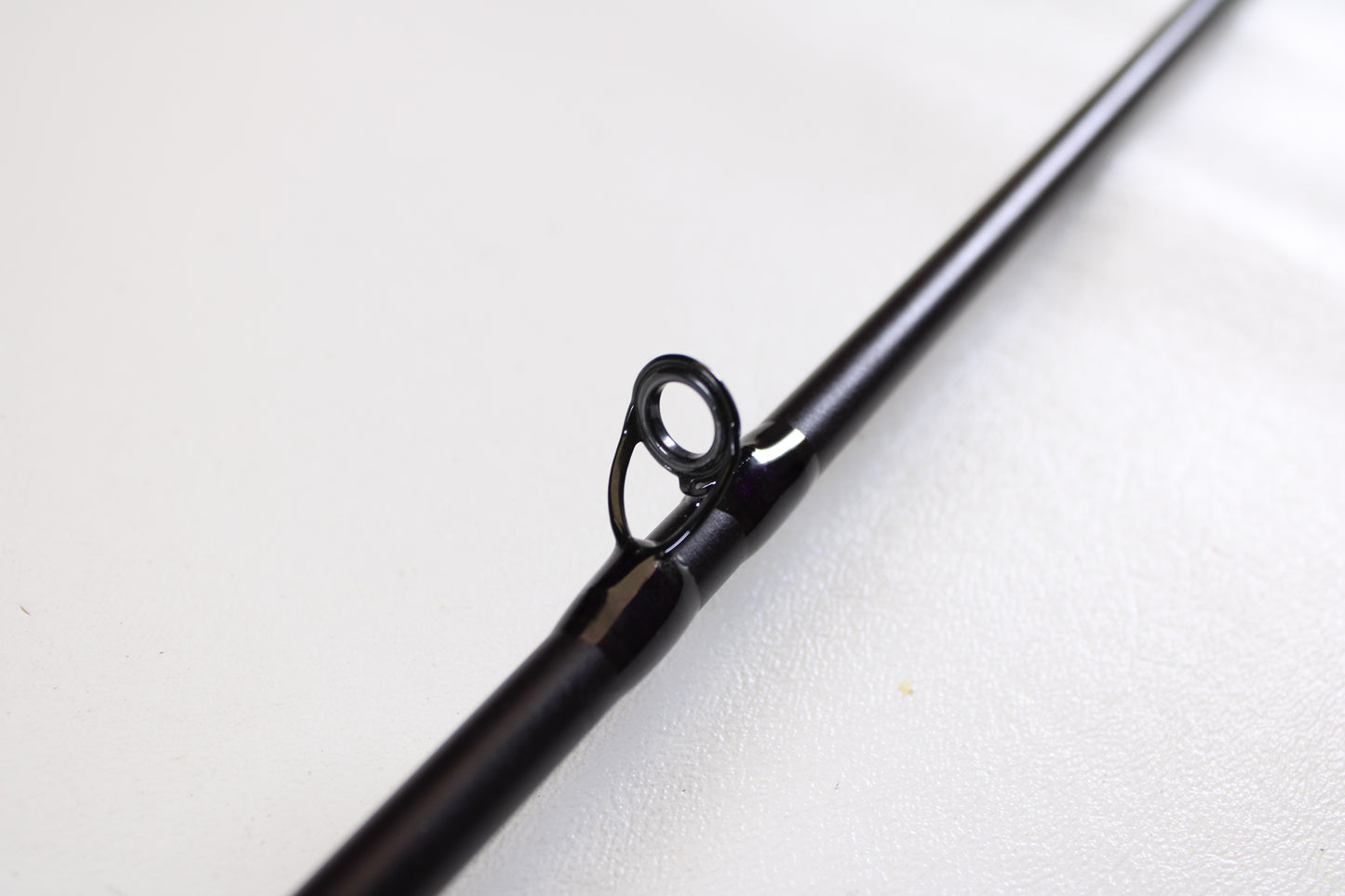 A close-up of the St. Croix Mojo Bass JOC72MHMF 7'2" Medium Heavy Used Casting Rod in excellent condition shows a single line guide ring—ideal for anglers trading in gear or upgrading with the Rod and Reel Trade-In Program.