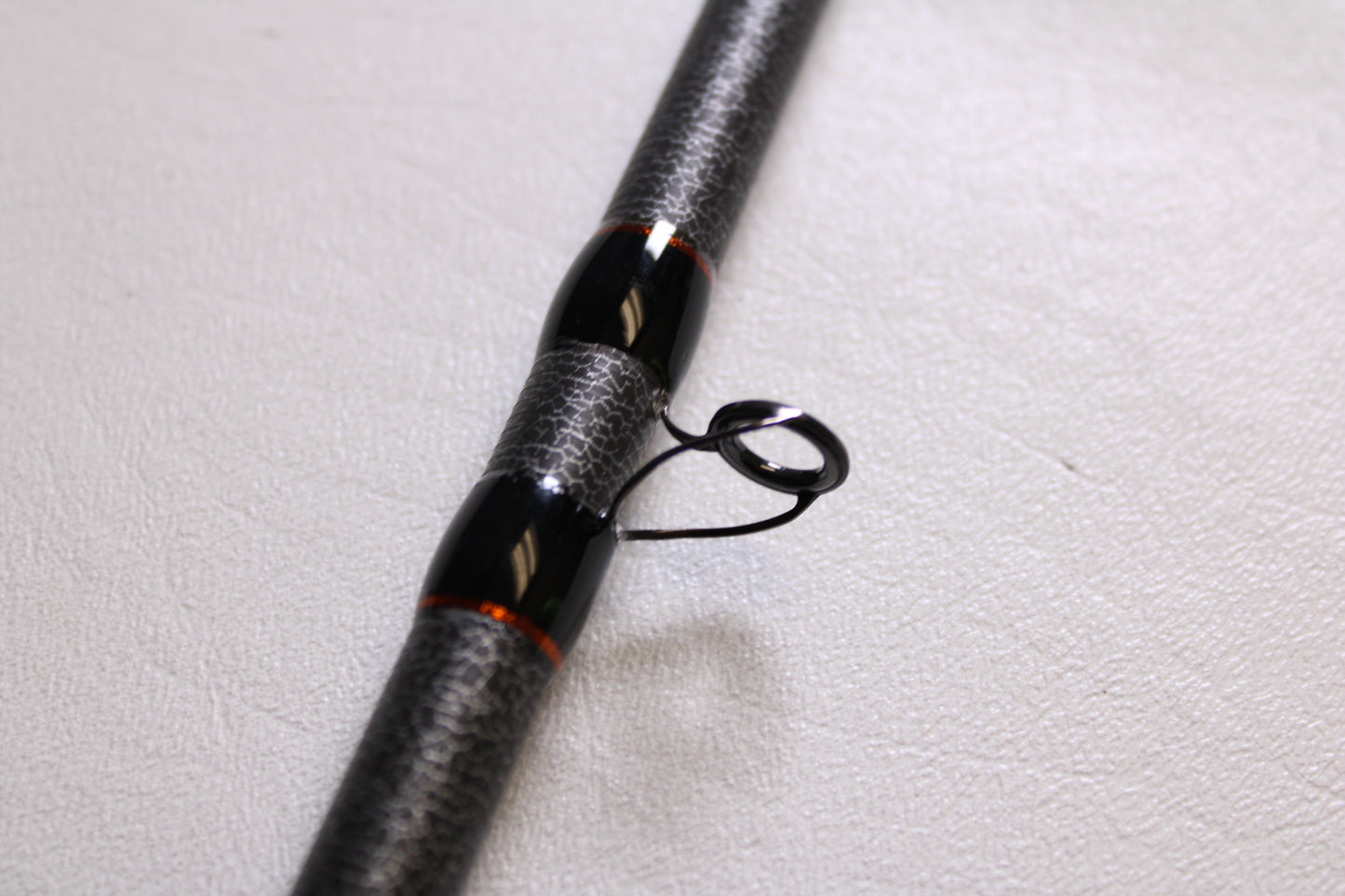 Close-up of the Favorite Fishing Rush Zach Birge RUHC-ZB-771H 7'7" Heavy Used Casting Rod in excellent condition—ideal for upgrading your gear with our Rod and Reel Trade-In Program.