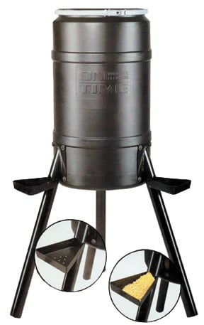 The On Time Game Feeder Buckeye Gravity 200# Tripod by On Time is a black, cylindrical feeder with a 200 lb capacity on three angled legs, featuring a perforated platform and gravity system shown holding corn.