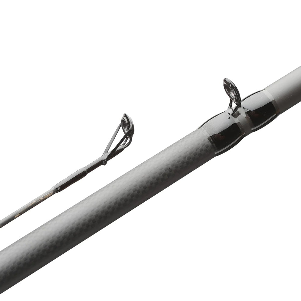 Close-up of the Falcon BuCoo SR Casting Rod "Weightless Worm" 6'7" Medium Heavy (BRC-5-167) by Falcon, highlighting its gray textured shaft and two Fuji metal guides against a plain white background.