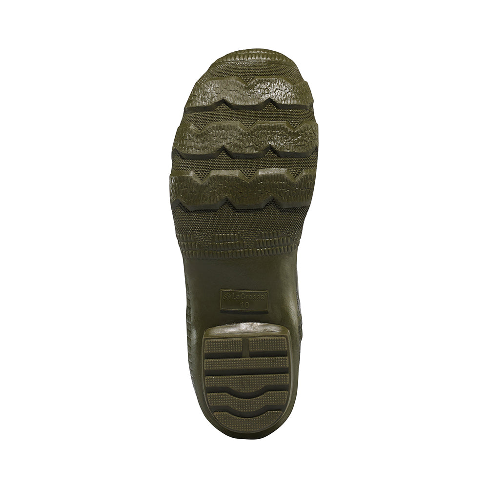 The image shows the sole of the Lacrosse Grange Rubber Boots 18", featuring thick, textured treads with horizontal ridges and grooves for superior grip. These waterproof Lacrosse boots are durable and perfect for outdoor use.
