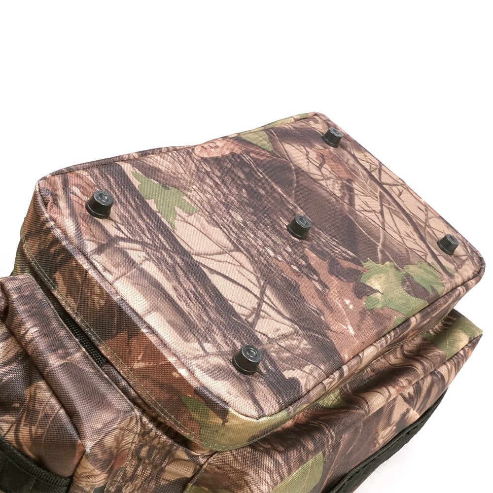 The Megabass Survival Bag II by Megabass features a camouflage pattern in earthy tones, a rectangular flap, five black snap buttons, and a design reminiscent of tree branches and leaves—making it ideal for versatile fishing use.
