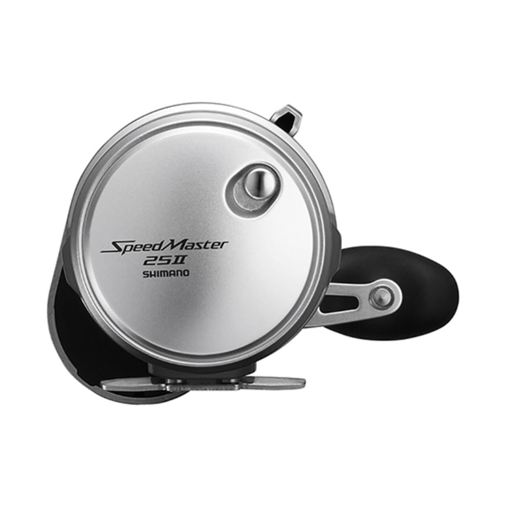 A close-up of the Shimano SpeedMaster 25II 5.2:1/2.3:1 2 Speed Conventional Reel, featuring a silver HAGANE Body in a circular design with black and metallic accents and a right-side handle, set against a plain white background.