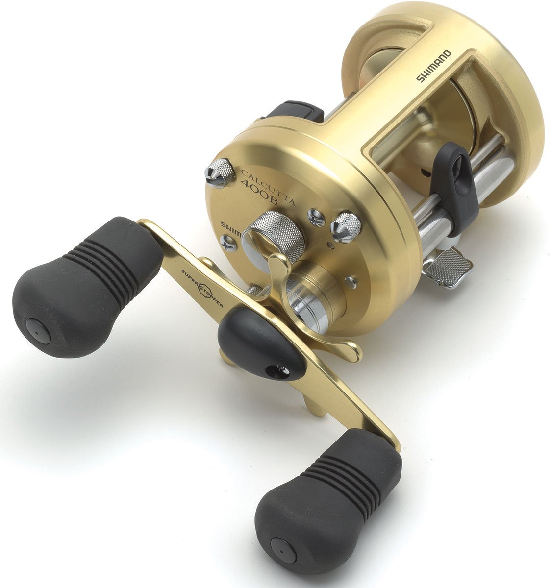 A Shimano Calcutta B 5.0:1 Round Casting Reel CT400B with Dartanium Drag, black rubber handle grips, and visible adjustment knobs is shown on a white background.