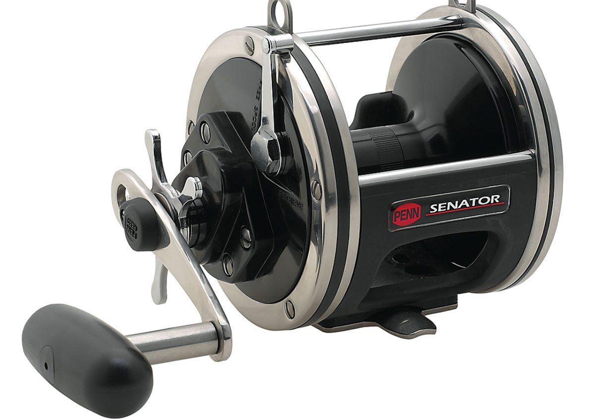 A close-up of the Penn Senator Star Drag Conventional Reel 115L2 highlights its durable black and silver design, sturdy handle, and branded Penn label—an essential offshore reel for dedicated anglers.