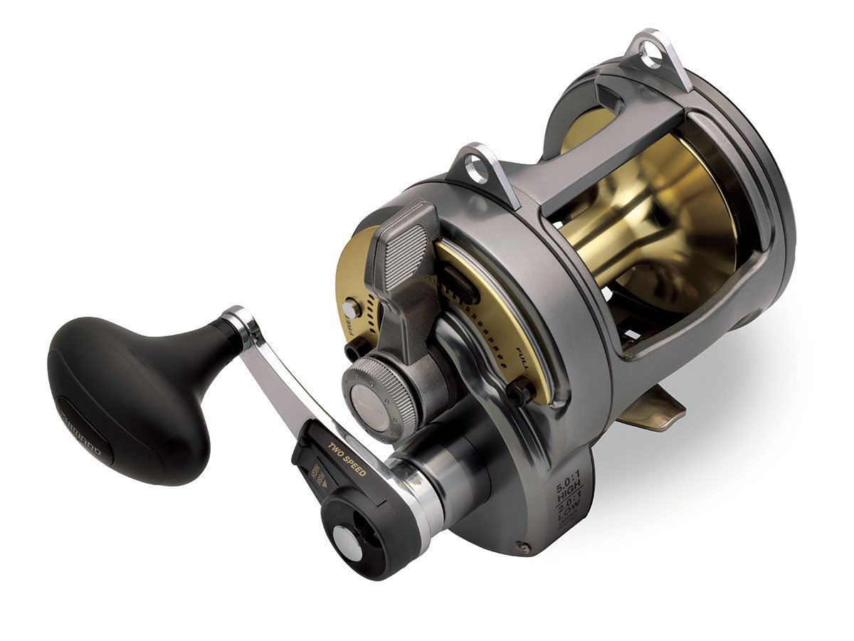 A close-up of the Shimano Tyrnos 30II 2-Speed Lever Drag Fishing Reel by Shimano, featuring a large handle, exposed spool, and sturdy metal build for heavy-duty saltwater fishing with high-speed gear ratios.