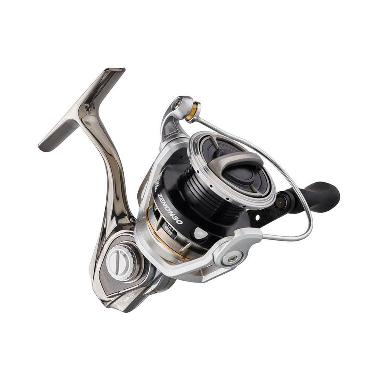 A silver and black fishing reel with a sleek design, featuring a handle and spool. The reel is angled, displaying its shiny metallic finish and streamlined curves against a white background.