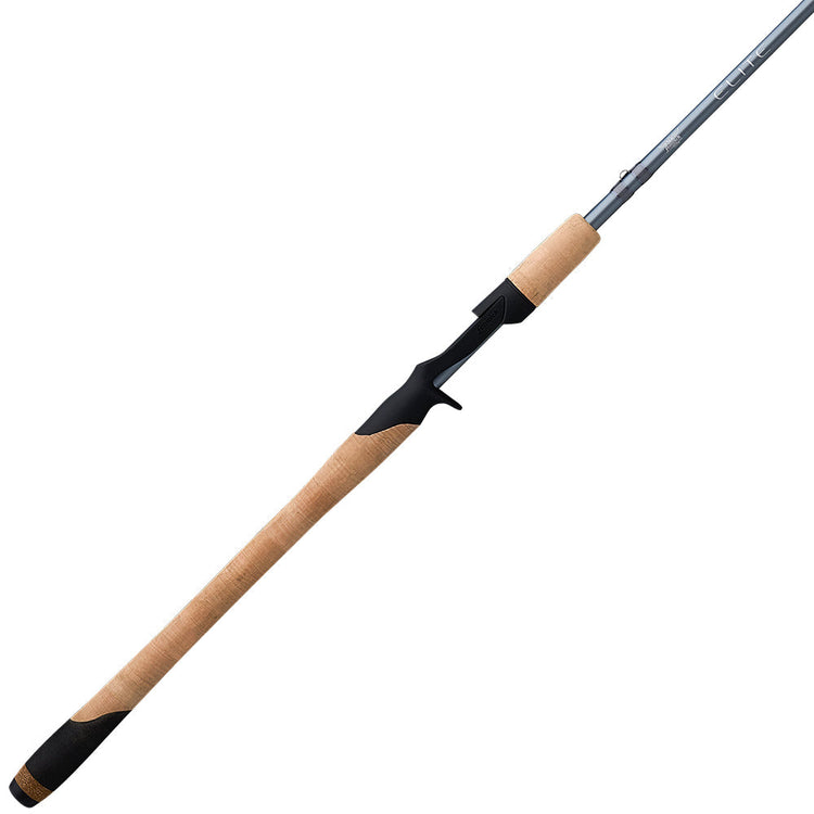 A fishing rod with a black reel seat and cork handle, featuring a sleek design. The rod is angled diagonally across a white background, showcasing its extended reach and craftsmanship.