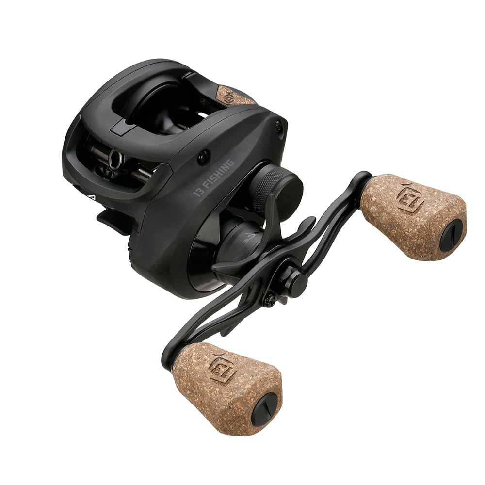 The 13 Fishing Concept A2 Casting Reel Left Hand 6.8:1 (A2-6.8-LH) is shown in black with dual cork handles and visible "13 Fishing" branding, displayed on a white background.