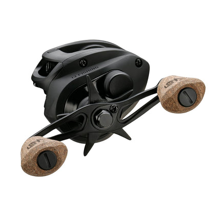 The 13 Fishing Concept A2 Casting Reel Left Hand 8.3:1 (A2-8.3-LH) features a black body, two tan cork handle grips, and is shown against a white background.