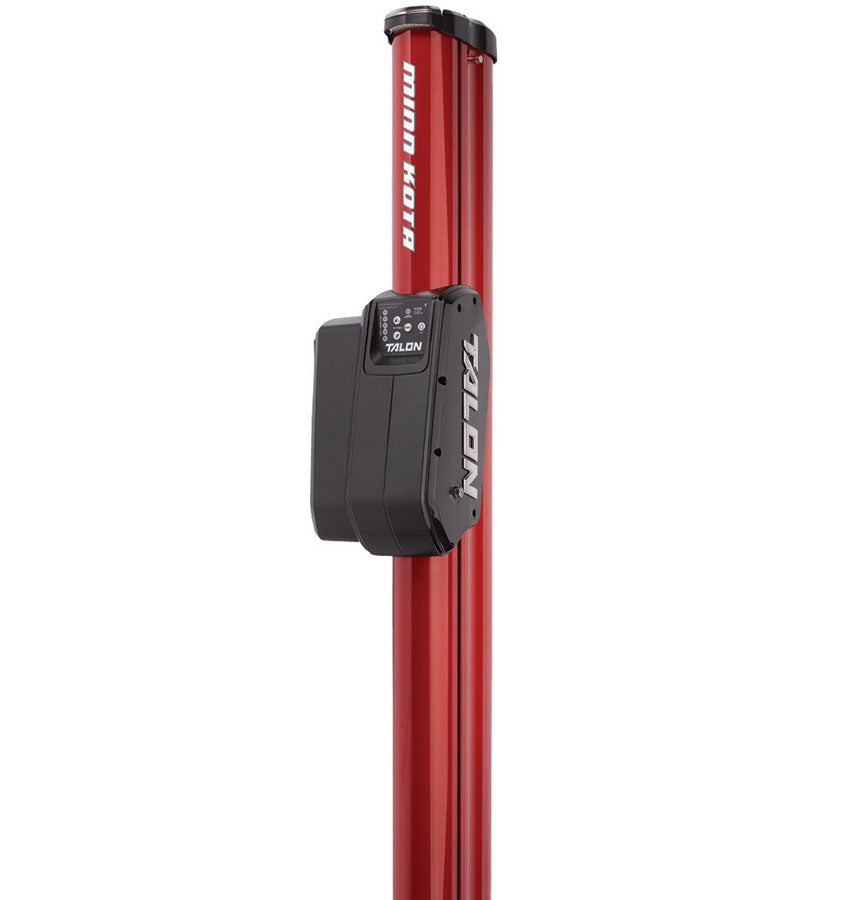 A red Minn Kota Talon Shallow Water Anchor w/Bluetooth stands vertically against a white background, with its black control unit visible.