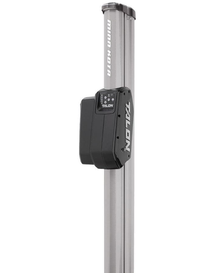 A close-up of the Minn Kota Talon Shallow Water Anchor w/Bluetooth shows its vertical silver shaft, black bracket with Minn Kota branding, and Bluetooth for custom anchoring modes.