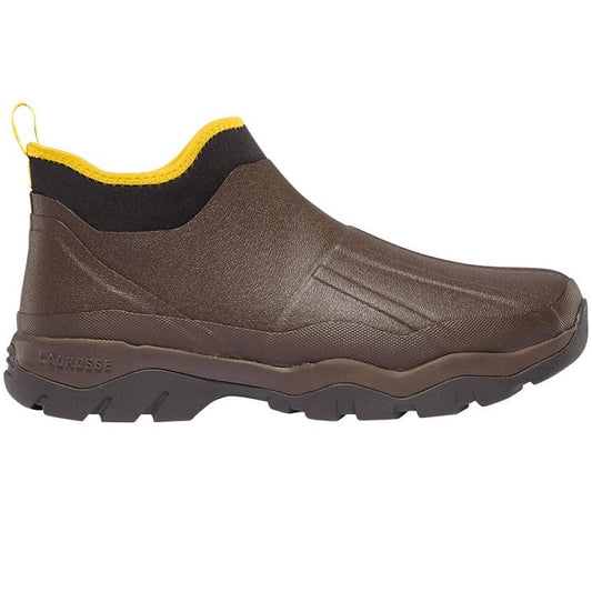 The Lacrosse Alpha Muddy Shoes Brown 4.5" features a brown rubber boot with a black sole and yellow top trim, offering waterproof durability and all-terrain traction. The pull-on design includes a textured, rugged sole for superior grip in any condition.
