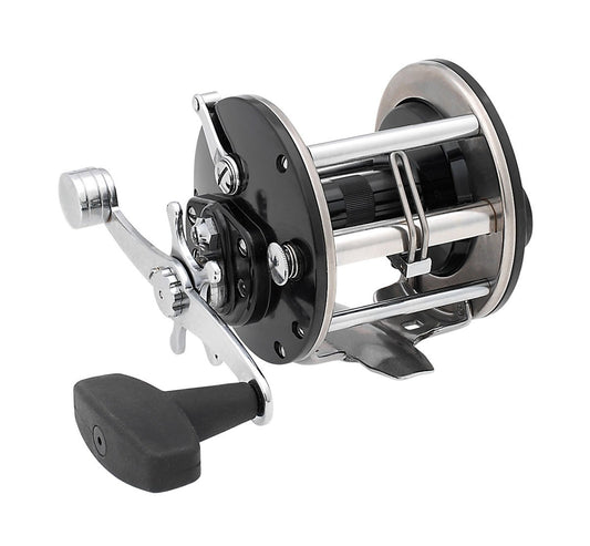 A close-up of the Penn General Purpose Level Wind Fishing Reel 3.4:1 9M shows its large handle and adjustment knobs in silver and black, displayed against a white background.