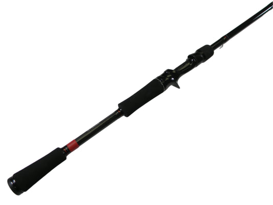 The 13 Fishing Meta MTGC76H 7'6" Heavy Used Casting Rod features a black baitcasting reel seat and handle with a red accent near the grip, set diagonally against a white background. Ideal for trading in used gear for store credit through the Rod and Reel Trade-In Program.