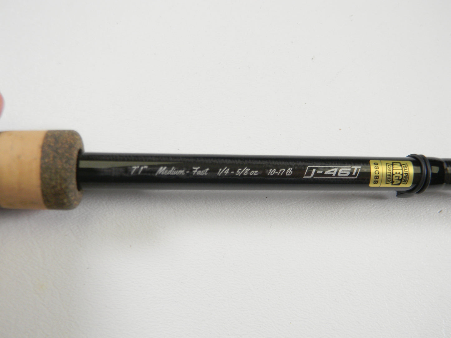 A close-up of a 13 Fishing Envy Black 3 EB3C71M 7'1" Medium Used Casting Rod in excellent condition with specs and labeling, perfect for rod and reel trade-in or evaluating used gear for store credit.