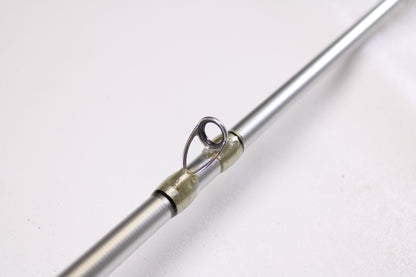 Close-up of a Denali Android ADC704WJ 7'0" Heavy - Used Casting Rod in good condition, highlighting a silver guide with wrapped thread—ideal for those considering our Rod and Reel Trade-In Program or quality used gear.