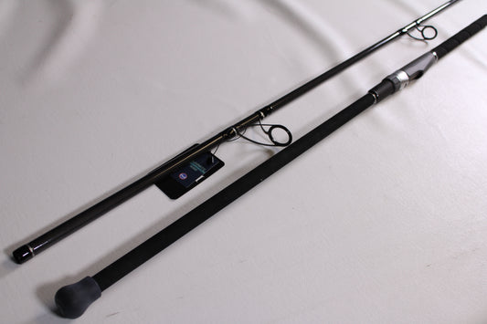 The ODM Rods Frontier X NXFX-1064 10'6" used spinning rod, in mint condition, is shown in two sections with a padded handle and tag—ideal for anglers seeking quality pre-owned gear or trade-in options.