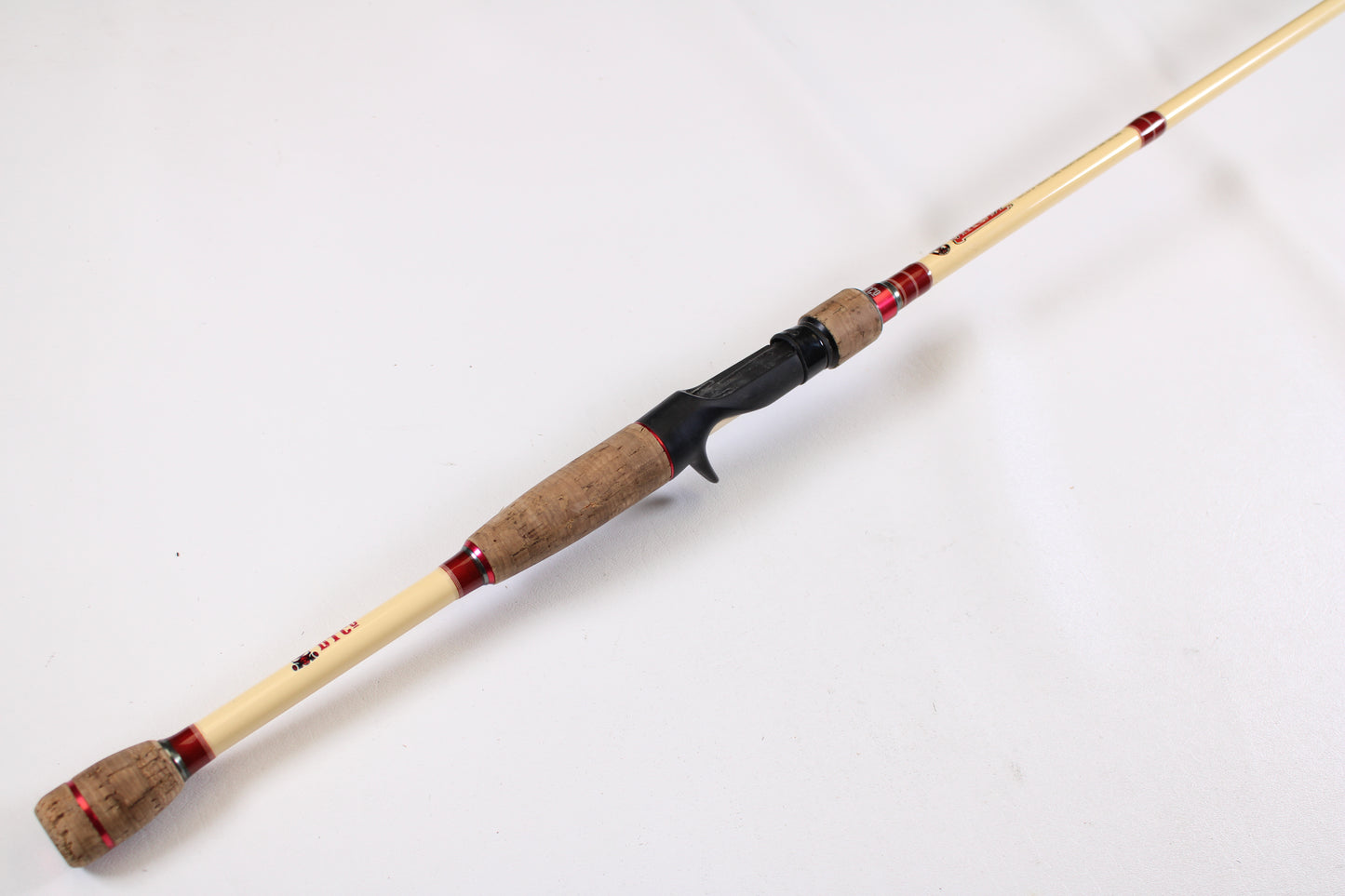 A Doomsday Tackle Co. The 47 T47C-673F 7'3" Heavy used casting rod in very good condition, displayed diagonally on a white background—ideal for those seeking quality used gear or extra value with our rod and reel trade-in program.