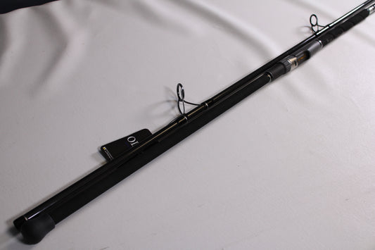 The ODM Rods Frontier X NXFX-1066 10'6" Used Spinning Rod in mint condition, with line guides and a "10" tag by the handle, is perfect for our used gear selection and eligible for the Rod and Reel Trade-In Program.