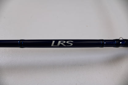 A close-up of the Douglas LRS C704M 7'0" Medium Used Casting Rod in excellent condition, featuring "LRS" in white on a dark blue surface—ideal for those interested in our Rod and Reel Trade-In Program.