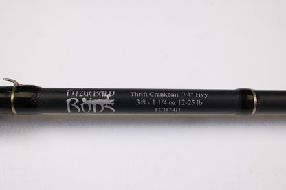 Close-up of a Fitzgerald Bryan Thrift TCB74H 7'4" Heavy Crankbait Used Casting Rod in good condition—eligible for our Rod and Reel Trade-In Program for store credit on used gear.