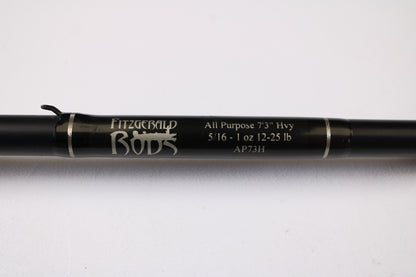 Close-up of a Fitzgerald AP73H 7'3" Heavy Used Casting Rod in very good condition, featuring silver bands and a hook keeper—ideal for anyone using store credit or trading in used gear.