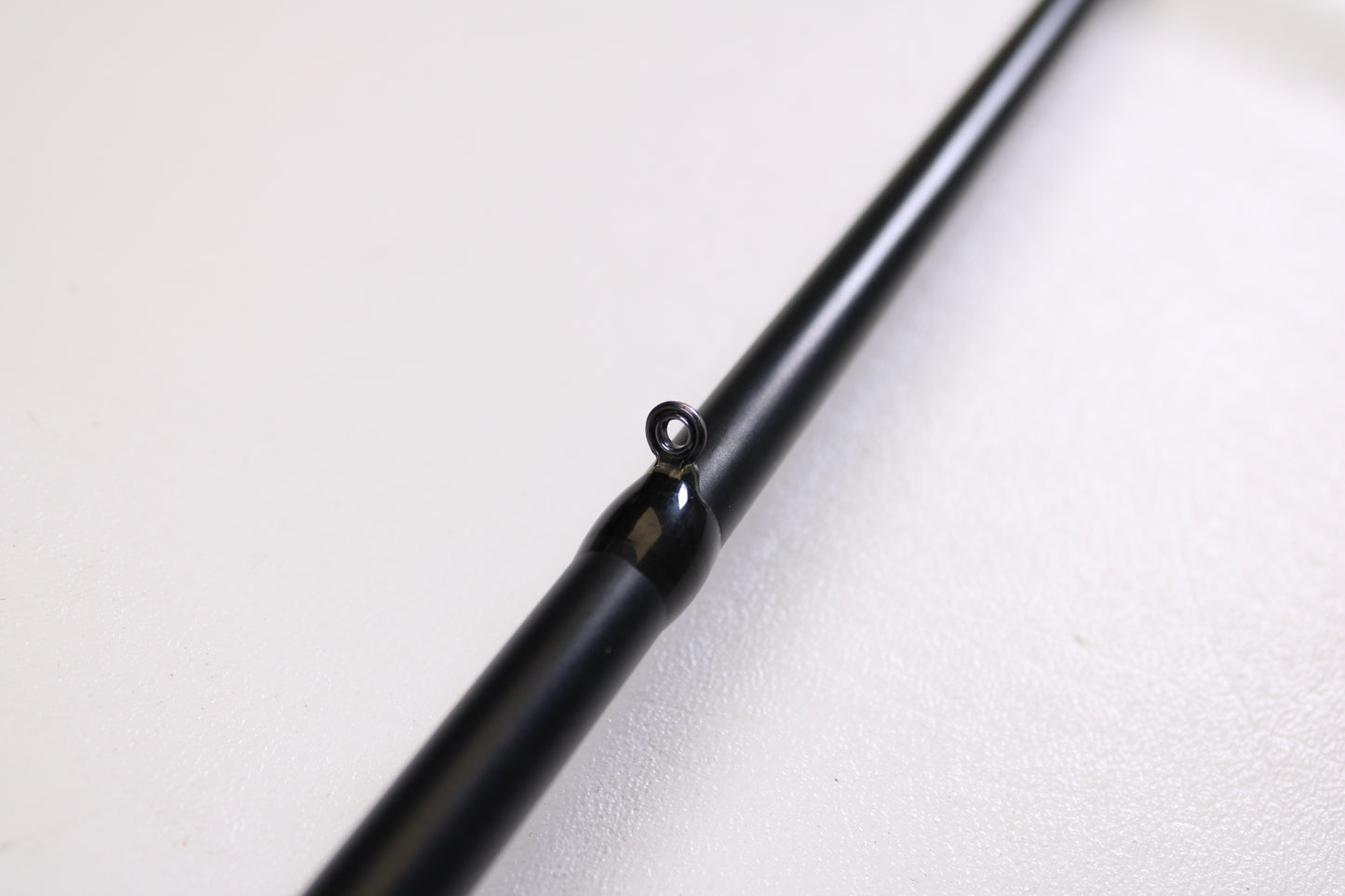 Close-up of a Fitzgerald AP73H 7'3" Heavy Used Casting Rod in very good condition, highlighting a single rod guide—ideal for upgrading through our Rod and Reel Trade-In Program for store credit.