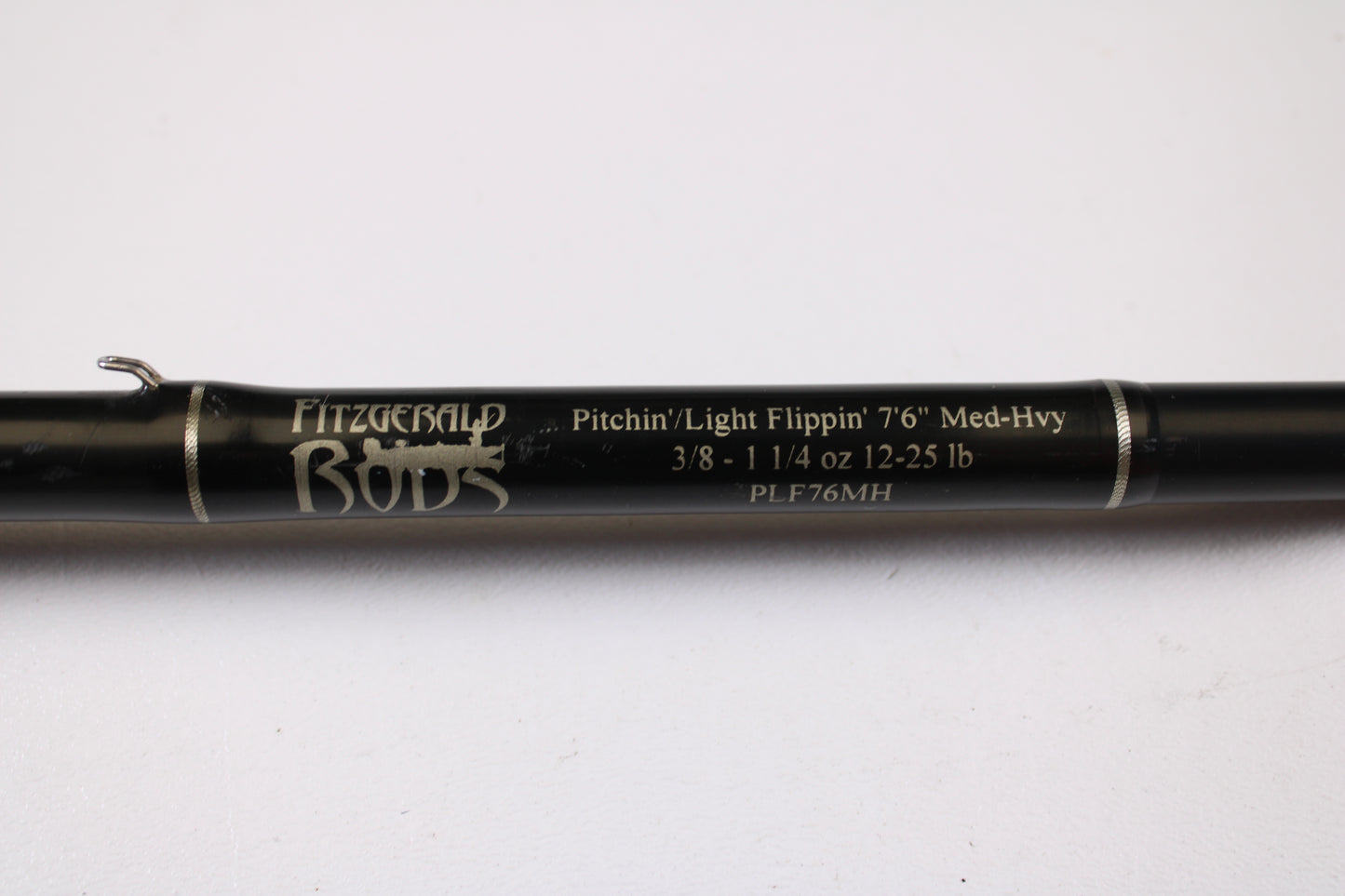 A close-up of a Fitzgerald PLF76MH 7'6" Medium Heavy Used Casting Rod in very good condition. Perfect for anglers exploring our rod and reel trade-in program or looking for quality used gear.