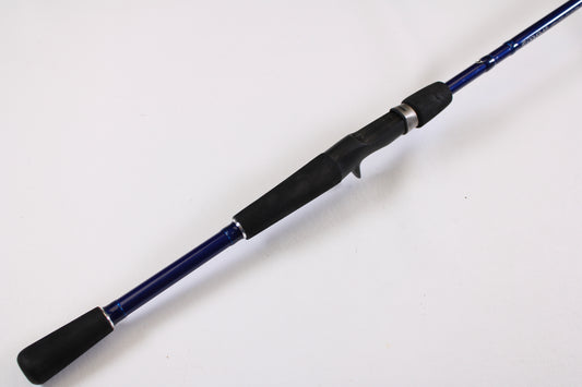 A close-up of the Douglas LRS C745F 7'4" Medium Heavy casting rod in excellent used condition, displayed diagonally against a white background—ideal for our rod and reel trade-in program to upgrade your gear.