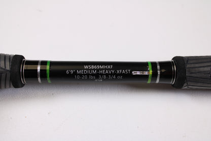 Close-up of the FXtreme Angler Series WSB69MHXF 6'9" Medium Heavy Used Casting Rod—Very Good Condition, by FXtreme, with black, green, and silver accents—ideal for upgrades via our rod and reel trade-in program.