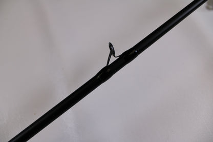 Close-up of a Dobyns Champion XP DC795SB Used Casting Rod in excellent condition, featuring a single metal guide ring—perfect for upgrading your fishing gear or trading in through our rod and reel program.