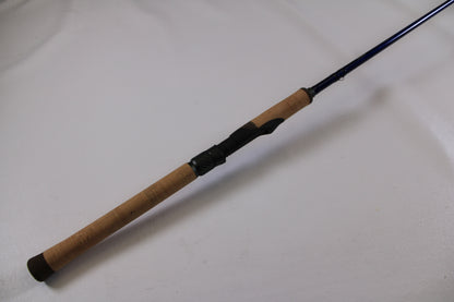 Upgrade your used gear with our Rod and Reel Trade-In Program—check out the St. Croix Legend Tournament Walleye LWTS66MF Used Spinning Rod in excellent condition, featuring a cork handle and blue reel seat, against a plain white background.