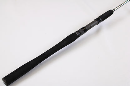 A close-up of the Maxel Platinum Slow Pitch MPSPS 661MH 6'6" Medium Heavy Used Spinning Rod handle in mint condition, perfect for anglers seeking quality used gear or trading in a rod and reel.