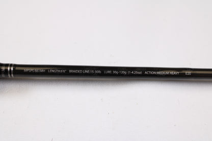 A close-up of a Maxel Platinum Slow Pitch MPSPS 661MH 6'6" medium heavy used spinning rod in mint condition, displaying its specs—perfect for anglers interested in quality used gear or a rod and reel trade-in.