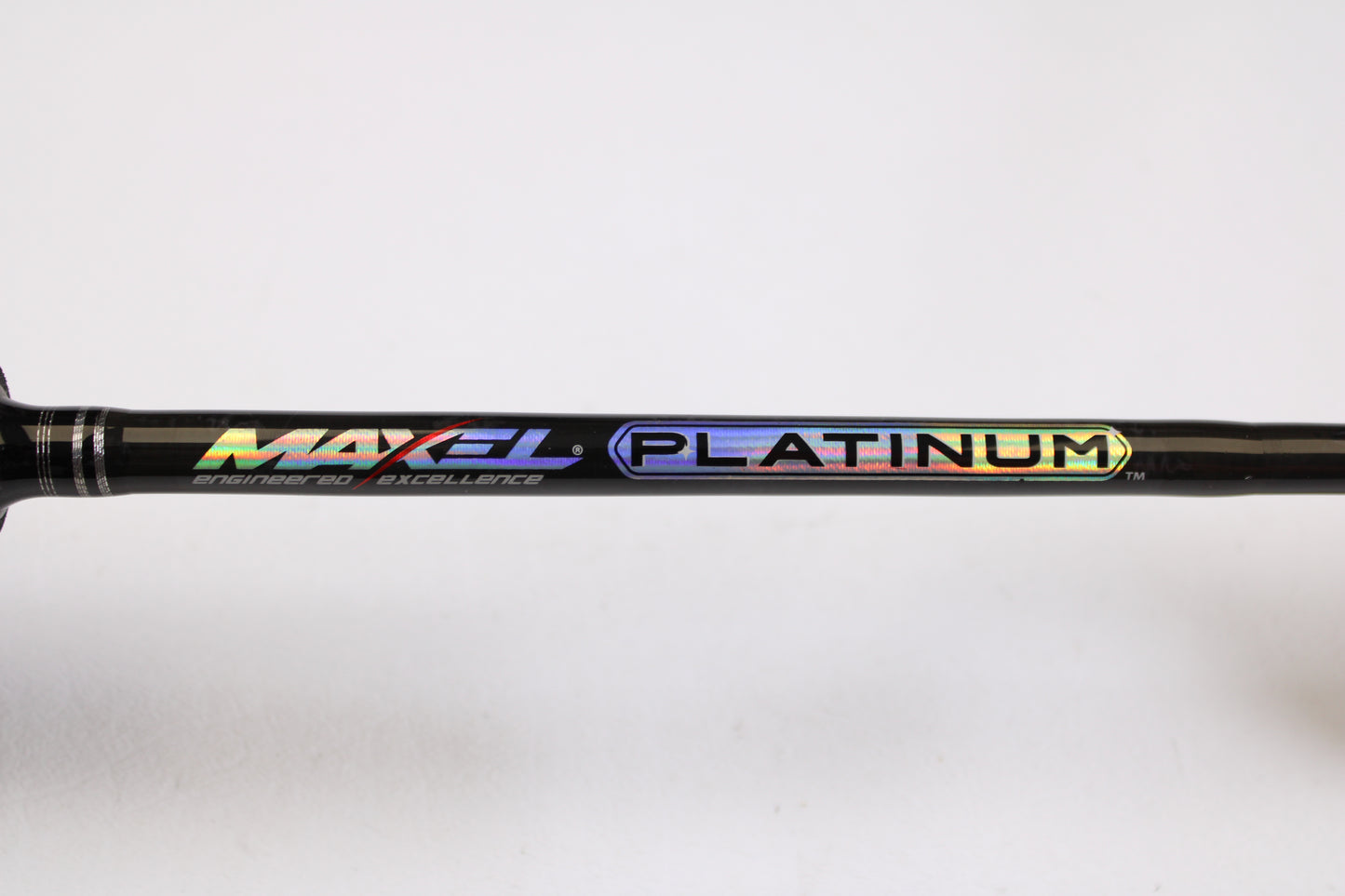Close-up of a Maxel Platinum Slow Pitch MPSPS 661MH 6'6" Medium Heavy Used Spinning Rod (mint condition) with holographic branding—ideal for those trading in rods and reels or shopping for quality used gear.