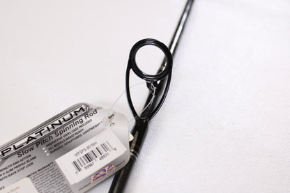 Close-up of a Maxel Platinum Slow Pitch MPSPS 661MH 6'6" Medium Heavy used spinning rod in mint condition, shown near the guide ring on a white surface—great for those interested in store credit or our rod and reel trade-in program.