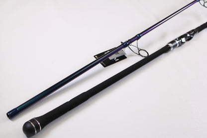 Two ODM Rods EVO X NXEX-116 11'0" used spinning rods in excellent condition, featuring black foam handles and metallic reel seats, are pictured diagonally on a white surface—great candidates for our Rod and Reel Trade-In Program.