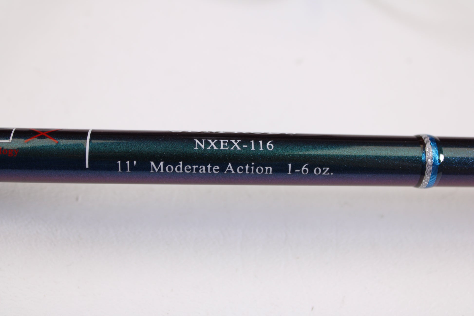 A close-up of the ODM Rods EVO X NXEX-116 11'0" 2pc Used Spinning Rod in excellent condition shows its specs on the shaft—ideal for earning store credit with our Rod and Reel Trade-In Program.