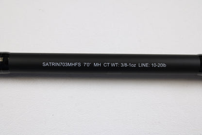 Close-up of a Daiwa Saltiga Inshore Travel SATRIN703MHFS 7'0" medium heavy 3pc spinning rod in excellent condition on white. Ideal for upgrading via our Rod and Reel Trade-In Program; get store credit for your used gear.