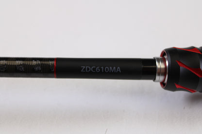 A close-up of a Shimano Zodias ZDC610MA 6'10" Medium Used Casting Rod in excellent condition, showing black with red accents and the code "ZDC610MA" in white. Ideal for trade-ins through the Nation's Best Rod and Reel Trade-In Program. Plain white background.