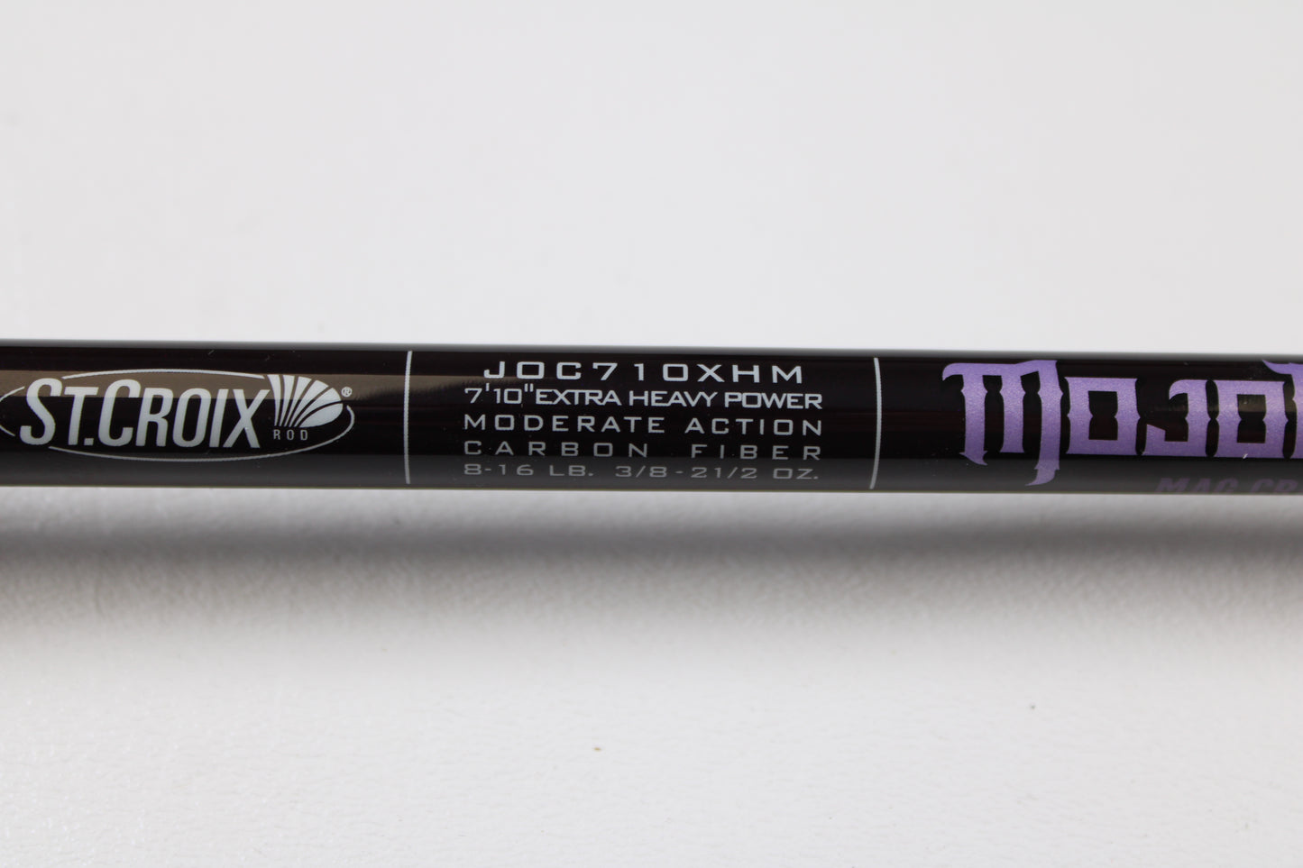 Close-up of a used St. Croix Mojo Bass JOC710XHM Mag Cranker 7'10" XH casting rod in mint condition—eligible for our Rod and Reel Trade-In Program or store credit.