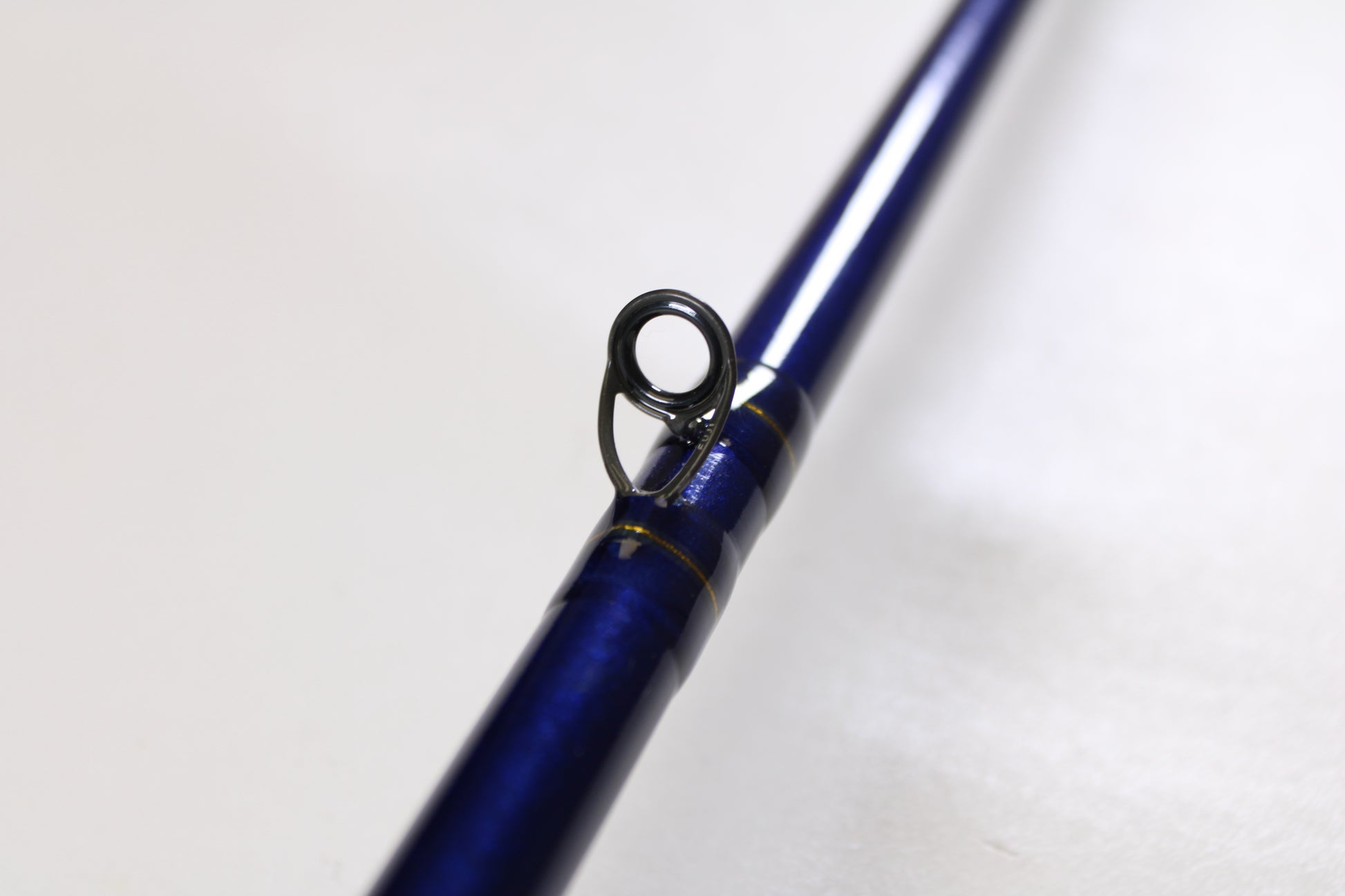 Close-up of the St. Croix Legend Tournament Bass LBTC710XHF Mid Swimbait 7'10" XH Used Casting Rod in mint condition, highlighting a metal line guide—ideal for those considering our rod and reel trade-in program for store credit.