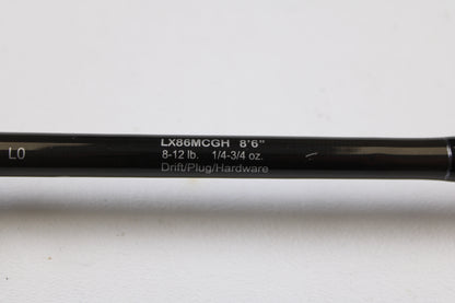 Close-up of a Lamiglas X11 Graphite Handle LX86MCGH 8'6" Medium 2 Piece Used Casting Rod—Excellent Condition, showing specs: 8-12 lb, 1/4-3/4 oz—ideal for our used gear or rod and reel trade-in program.