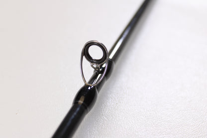 Close-up of the guide ring on a Lamiglas X11 Graphite Handle LX86MCGH 8'6" Medium 2 Piece Used Casting Rod in excellent condition—ideal for anglers seeking quality pre-owned Lamiglas gear.