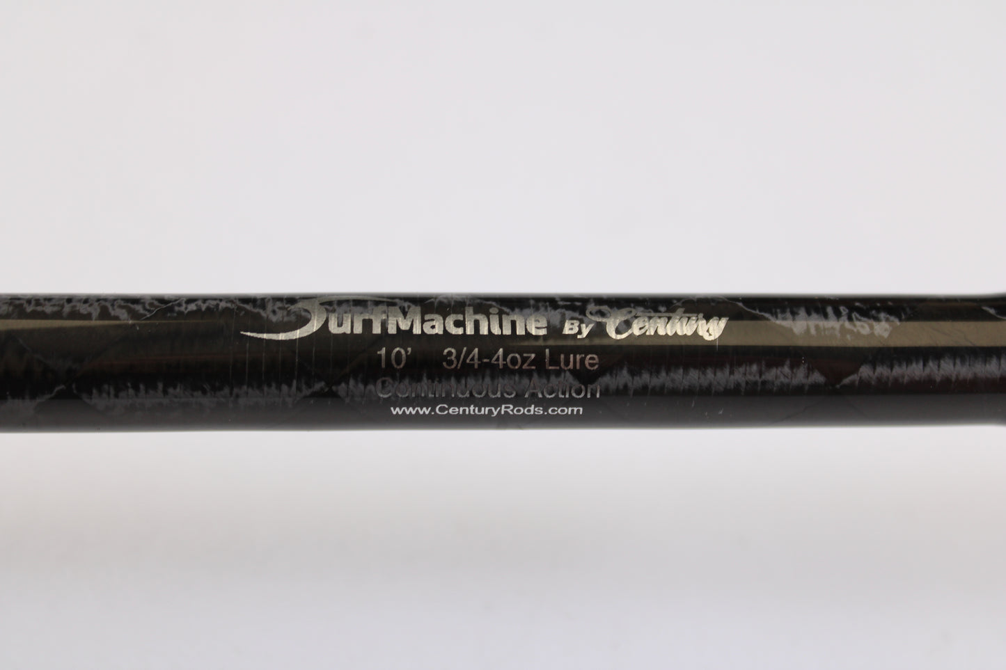 Close-up of a black Century SurfMachine SM10L 10'0" 2-piece spinning rod in excellent used condition, with specs and "www.CenturyRods.com" on the rod. Ask about our Rod and Reel Trade-In Program for store credit!.