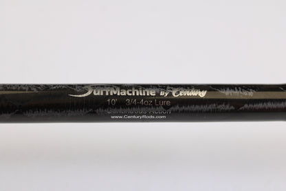 Close-up of a black Century SurfMachine SM10L 10'0" 2-piece spinning rod in excellent used condition, with specs and "www.CenturyRods.com" on the rod. Ask about our Rod and Reel Trade-In Program for store credit!.